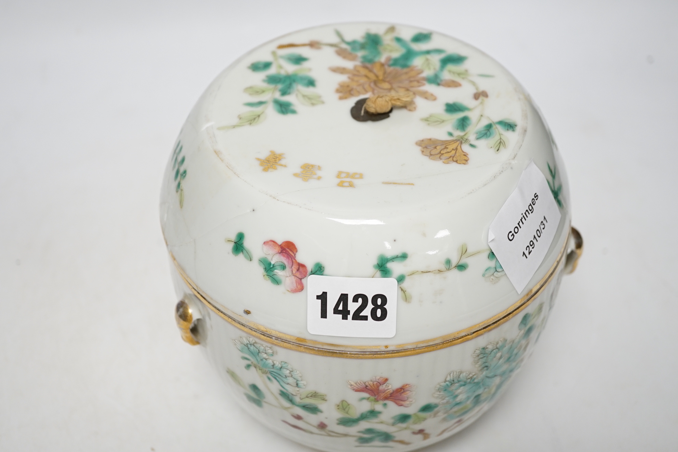 A Chinese enamelled porcelain barrel shaped jar and covered, 19th century, 16cm high